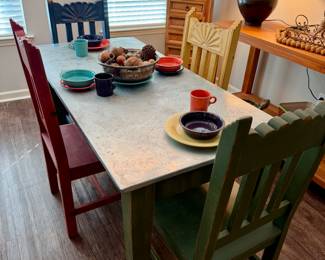 galvanized metal top table with 4 wood chairs. 