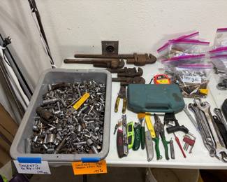 PIPE WRENCHES AND HUNDREDS OF SOCKETS.