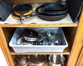 CAST IRON COOKWARE, EXTRA LIDS AND A FEW POTS.