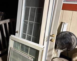 SEVERAL DOORS AND SECURUTY STORM DOORS,