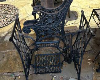 ANTIQUE METAL SINGER TREADLE, AND ANTIQUE BENCH ARMS.