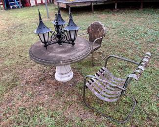 CONCRETE TABLE AND ANTIQUE METAL ROCKER