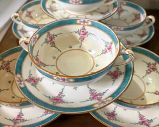 ANTIQUE CUPS AND SAUCERS