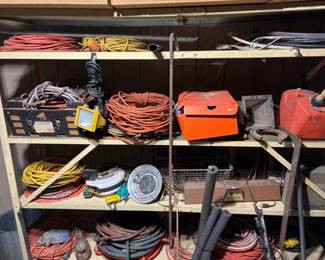 LOTS OF HEAVY-DUTY EXTENSION CORDS AND AIR LINES.