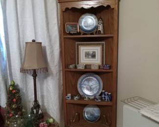 Corner cabinet with signed collectible ship plates, music box collection,  vintage glassware. 
