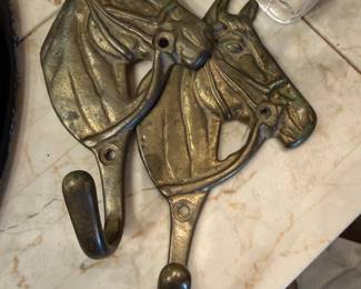 Brass equestrian hooks