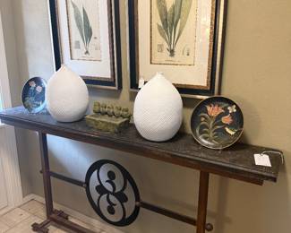 Long, thin console and lots of good accessories and wall art