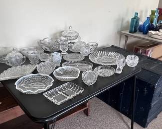 vintage cut glass wear and crystal, antique trunk.