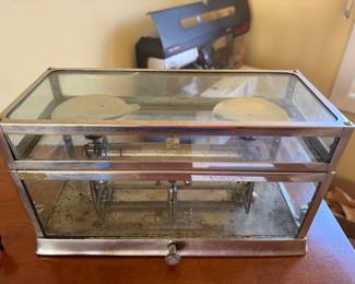 The Torision Balance Co. vintage scale in glass box