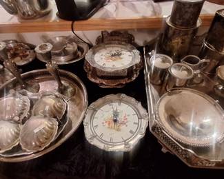 Plethera of silver plated serving trays, dishes, decor.