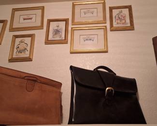 Leather briefcases and framed art