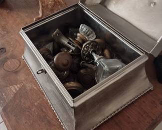 Antique doorknobs and hardware in glass, brass, wood.