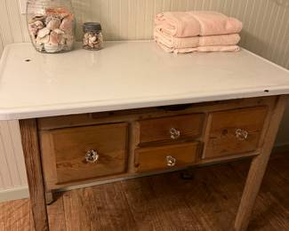 Table with white metal top