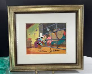 FRAMED HUCKLEBERRY HOUND, SIGNED BY BILL HANNA AND JOE BARBERA, NUMBERED HANDPAINTED ANIMATION ART CELL.