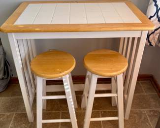Tile top breakfast bar with stools