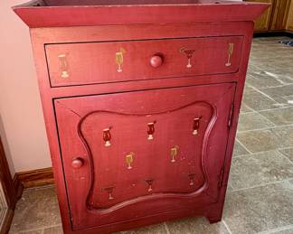 Small cabinet with wine motif