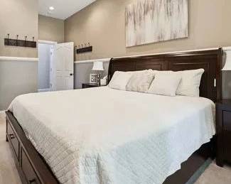 King bed includes 2 underbed bottom storage drawers at end of bed. $300. NO MATTRESS - NO BEDSIDE STANDS AVAILABLE