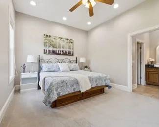 King bedroom set w/mattress on six drawer underbed storage, metal headboard, two white bedside tables  $290  Art work birch tree canvas $40. Bedside lamps $10/each