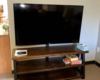 TV console with open shelves $50.  Also a 60" Samsung Smart TV $75