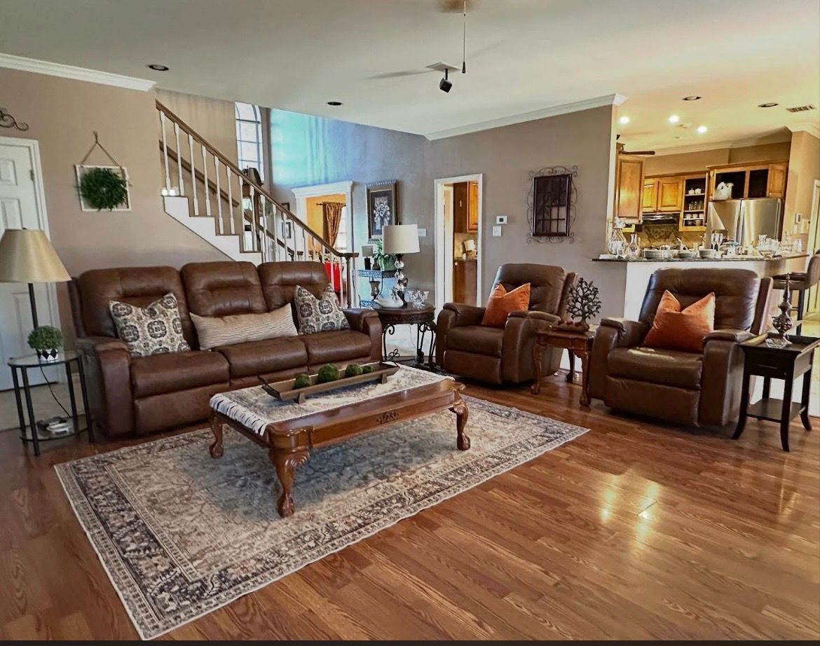 high end leather reclining sofa and arm chairs from Buddy Walker