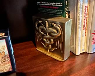 heavy brass medical emblem book ends