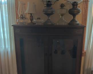 Vintage glass case/ antique oil lamps