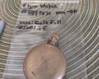 engraved G.F. watch case