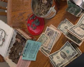 Collectable antique $1, $2 bills, foreign bills, lots of wheat pennies. 