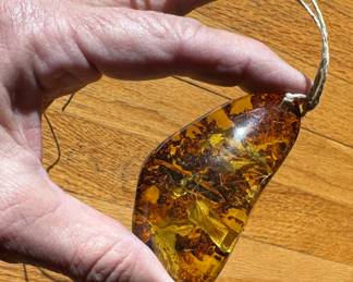 Giant smoothed amber with botanicals