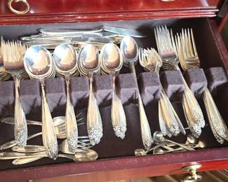 over 4,000+ grams of Sterling Silverware