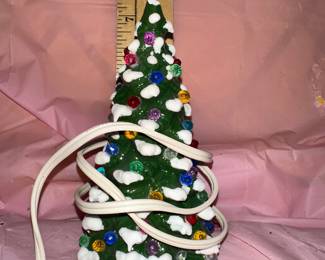 Small 8" Tree has a chip on the top $10.00