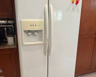 White Kenmore Elite SidebySide Refrigerator with Ice and Water Dispenser