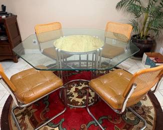 Glass Top Dining Set with Cane Back Chairs