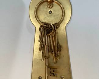 Brass key door knocker