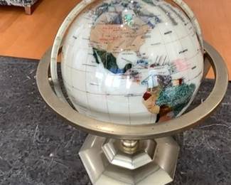 One of 3 gemstone and mother of pearl globes