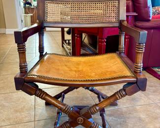 Vintage Campaign wood frame, cane backrest, leather seat. Hollywood Regency Style