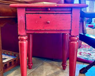 Red wooden end table