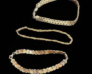 Set of Three 10K and 14K Gold Bracelets: Curb Link, Rope, and "XO" Charm