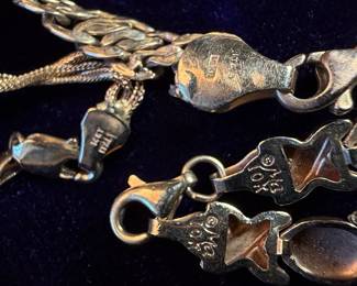 Set of Three 10K and 14K Gold Bracelets: Curb Link, Rope, and "XO" Charm