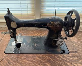 Singer "Vibrating Shuttle" Treadle Sewing Machine with Quarter Sawn Oak Cabinet