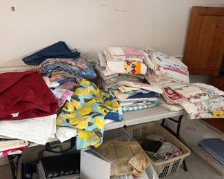 An abundance of table cloths 