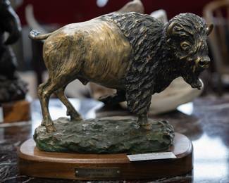 Carl Wagner “Prize Bull” Sculpture Powerful sculptural study of a Prize Bull by Carl Wagner, featuring expressive texture and rich patinated finish. A striking decorative artwork with strong presence—perfect for collectors of animal sculpture or rustic and Western-inspired interiors.