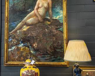 Large Antique Oil Painting – “Henrietta” by Lillian Genth A striking large-scale oil painting titled “Henrietta” by Lillian Genth, depicting a classical female figure resting along a rocky shoreline. Beautifully executed with rich, painterly brushwork and luminous tones. Presented in an ornate gilt frame with a brass title plaque reading “Henrietta – Lillian Genth.” An impressive statement piece perfect for anchoring a gallery wall or traditional interior.