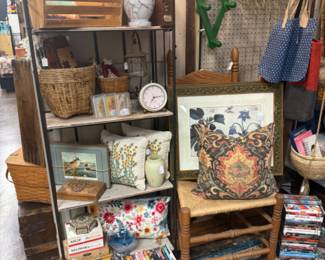 throw pillows, baskets, clock, vintage coat hanger