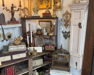 vintage lamps, beautiful wall sconces, decorative books and side tables
