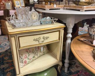 vintage bedside table with drawer, bowls, figurines, glassware