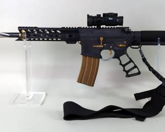Del-Ton Inc DTI-15 .223 Wylde Rifle SN# B-21505, Skeletonized Stock, Target Sports Red Dot Sight, Black Rain Charging Handle, Fluted Barrel, Nylon Sling, USN Seal On Receiver And 24K Gold Triple Dipped Parts Including Trigger, Forward Assist, Safety Switch, Dust Cover, Mag Release Catch, Trigger Group Pin Screws, Pivot Pin And Take Down Pin