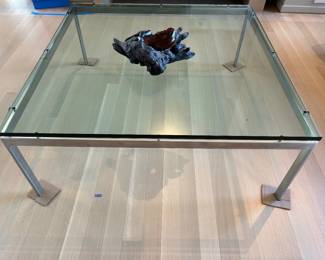 Heavy glass and metal table