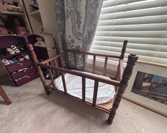 Antique wooden doll bed