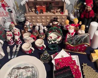 Wooden advent calendar house, Christmas figurines, holiday plates, decor